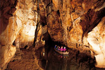 Underground boat ride in cave